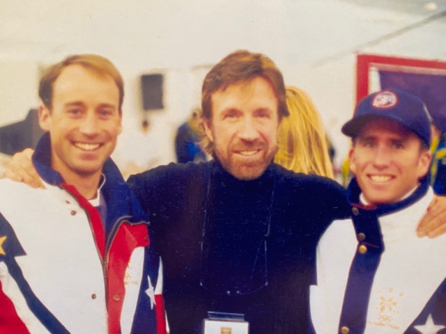 Tim Tetreault, Chuck Norris, and Dave Jarrett (L-R) at the 1998 Nagano Olympics.